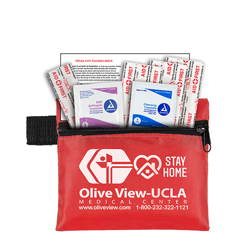 “Tag-a-Long” 7 Piece First Aid Kit Components inserted into Zipper Pouch